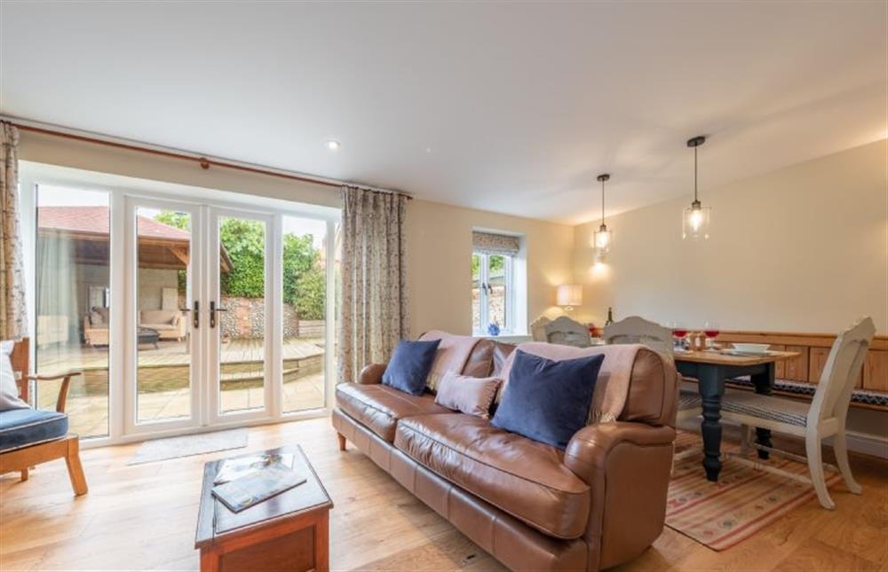 Ground floor: Sitting room with dining area  at The Barn, Great Ryburgh near Fakenham