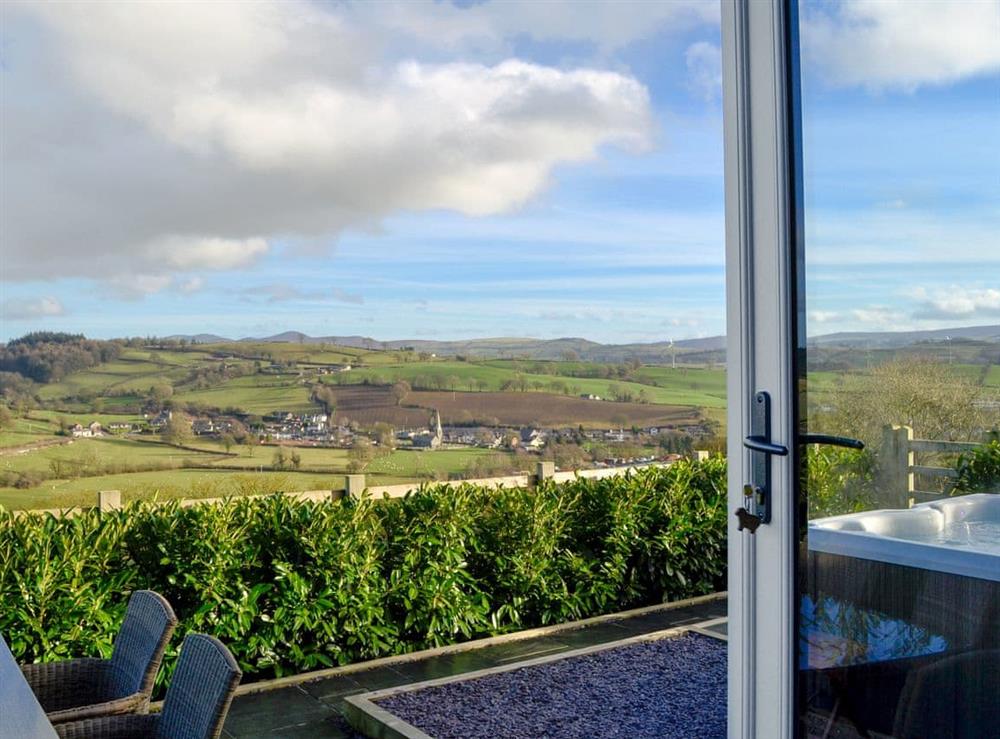 Paved patio with lovely views at The Barn in Gwyddelwern near Corwen, Denbighshire