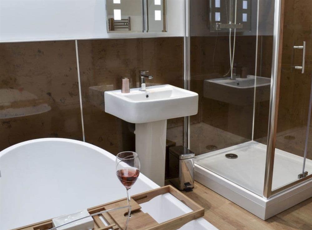 Bathroom with stand-alone bath at The Barn in Harwood Dale, near Scarborough, North Yorkshire
