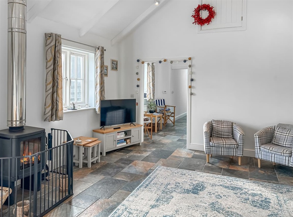 Living room/dining room at The Barn in Helston, Cornwall