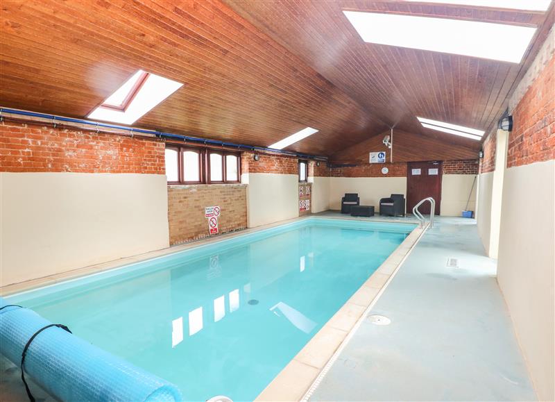 There is a swimming pool at The Barn, Hoveton & Wroxham