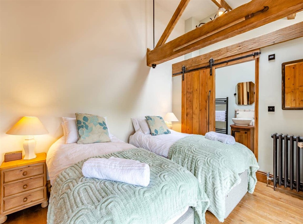 Twin bedroom at The Barn in Keighley, West Yorkshire