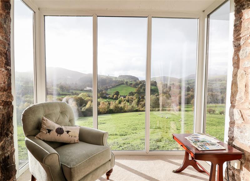 Relax in the living area at The Barn, Llanarmon-Yn-Ial