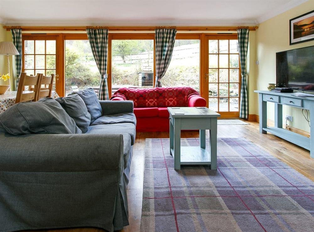 Open plan living space at The Barn in Lochearnhead, Perthshire