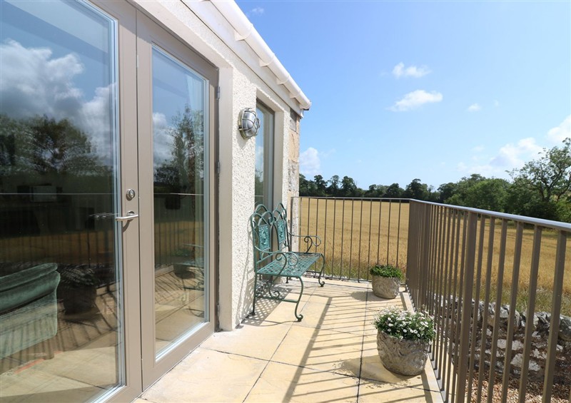 Enjoy a cup of tea on the patio at The Barn, Lower Lodge, Cupar