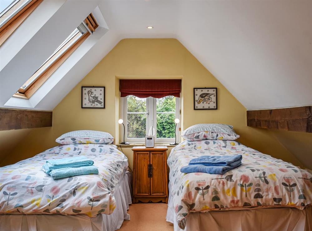 Twin bedroom at The Barn in Ramsden, near Chipping Norton, Oxfordshire