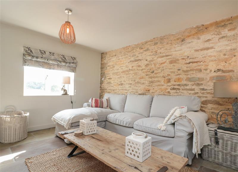 Relax in the living area at The Barn, Stillington
