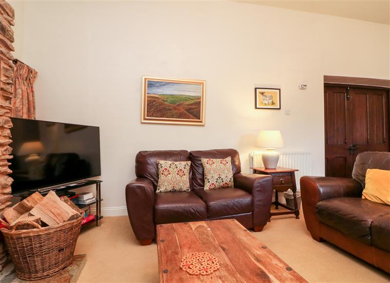 Relax in the living area at The Barn, Upton near Brompton Regis