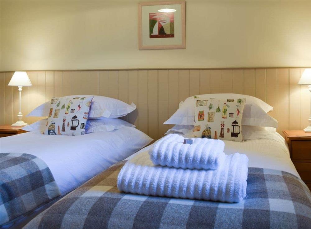 Pretty twin bedroom at The Barracks @ East Neuk Orchards in Arncroach, near St Andrews, Fife