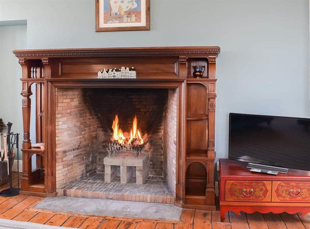 Relax in front of a roaring fire at The Barracks @ East Neuk Orchards in Arncroach, near St Andrews, Fife