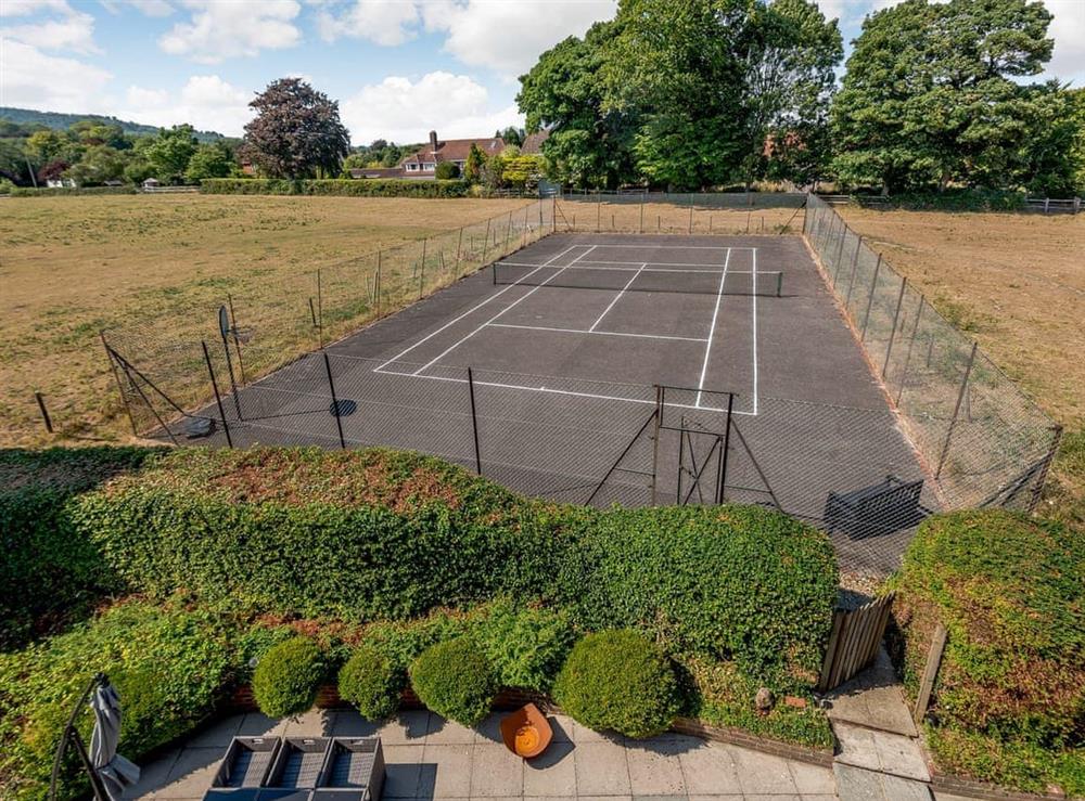Tennis court at The Barton in Steyning, near Brighton, West Sussex
