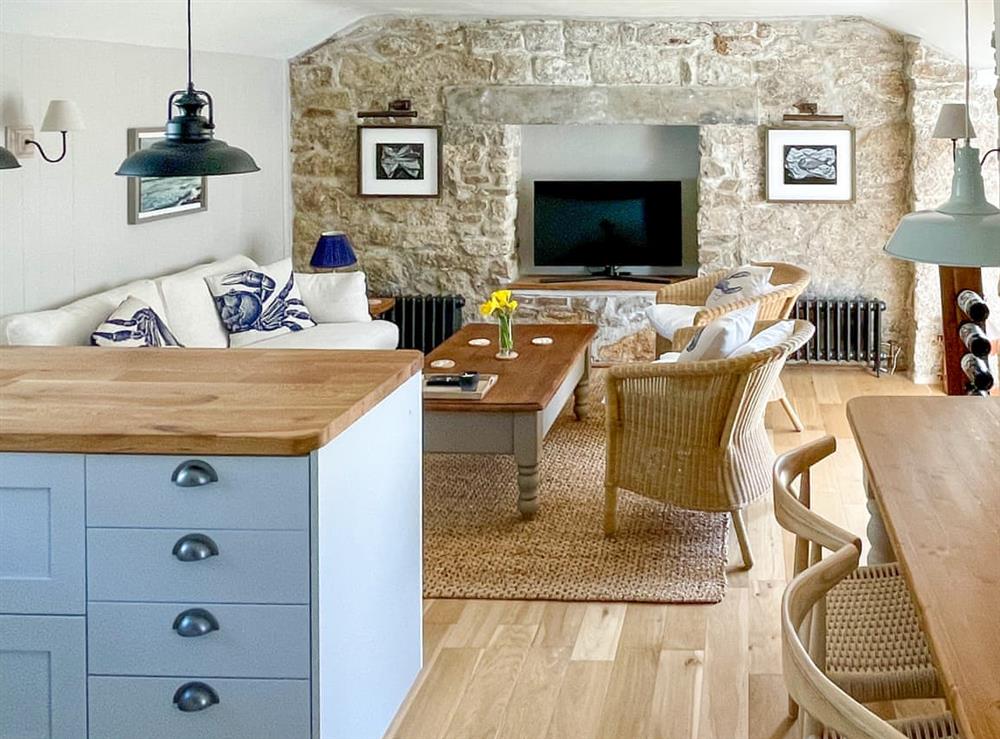 Open plan living space at The Basket Loft in Newlyn, Cornwall