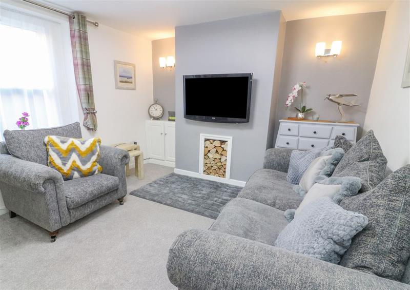 Relax in the living area at The Bay Cottage, Morecambe