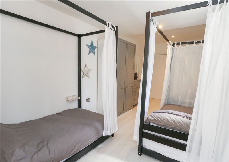 This is a bedroom (photo 2) at The Beach Condo, Weymouth