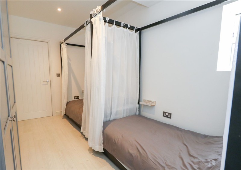 This is a bedroom (photo 3) at The Beach Condo, Weymouth