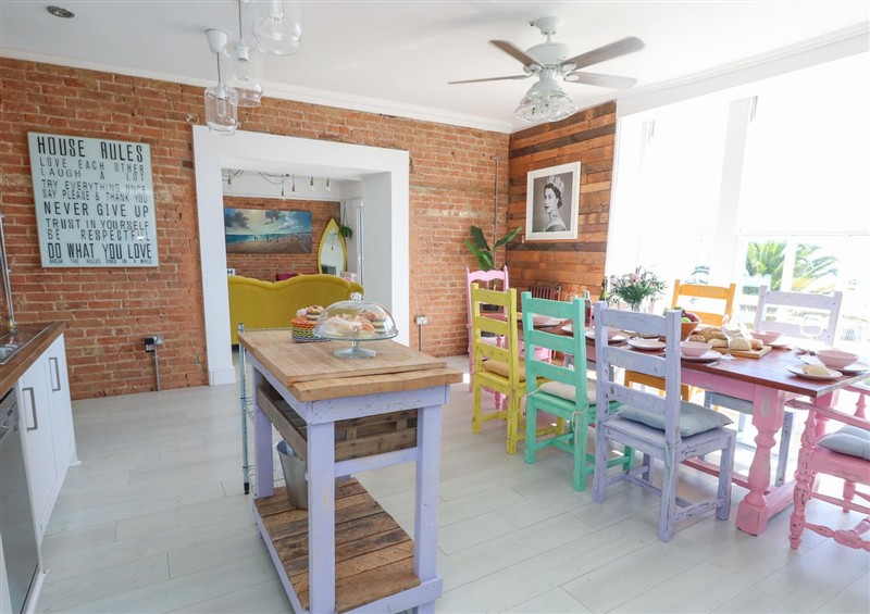 This is the dining room at The Beach Condo, Weymouth