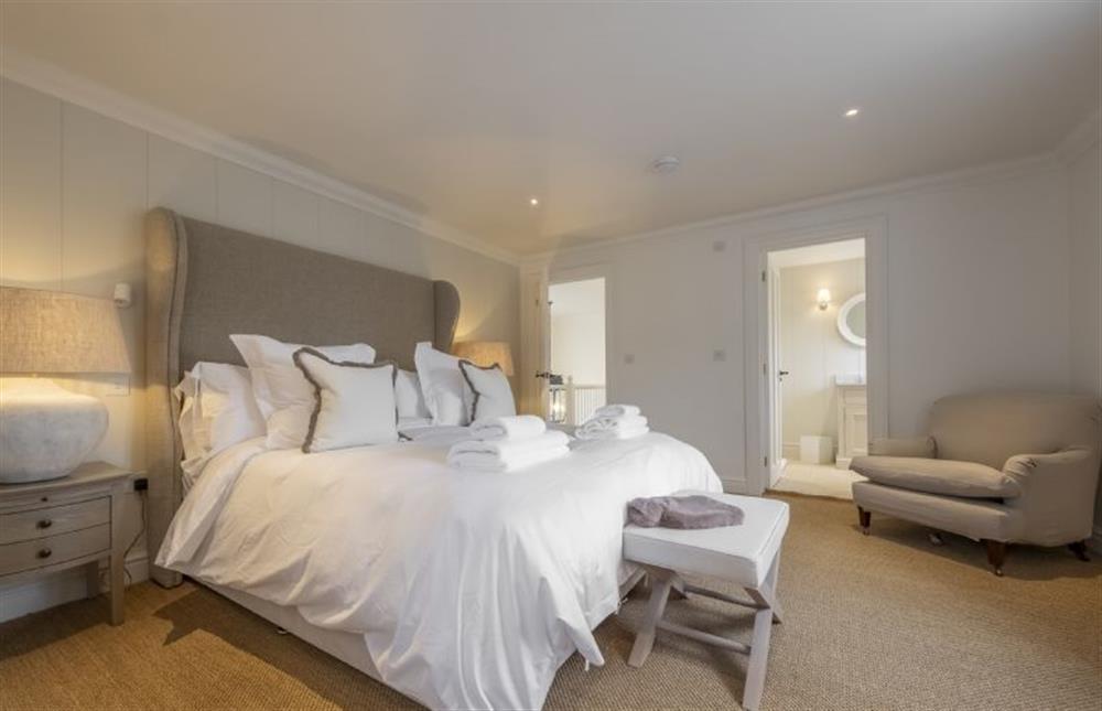 Master bedroom on 1st floor, offering a super-king bed with en-suite (photo 2) at The Beach House, Brancaster near Kings Lynn