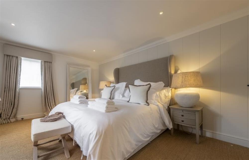 Master bedroom on 1st floor, offering a super-king bed with en-suite at The Beach House, Brancaster near Kings Lynn