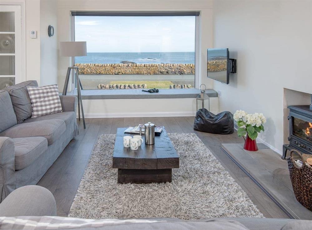 Comfortable living area with amazing sea views at The Beach House in Chathill, Northumberland