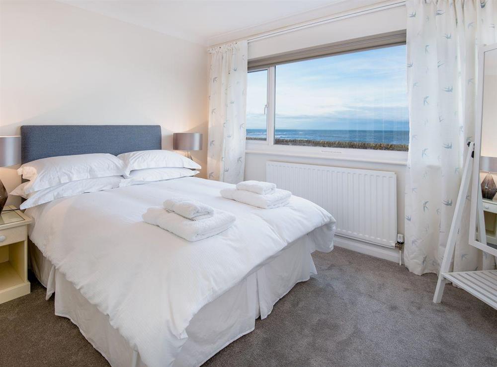Double bedroom with sea views at The Beach House in Chathill, Northumberland