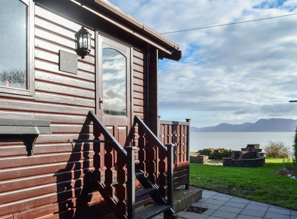Delightful lodge-style holiday cottage with impressive sea views at The Beach House in Llanfaes, Beaumaris, Anglesey., Isle of Anglesey