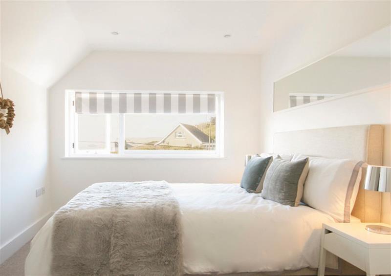 One of the 3 bedrooms at The Beach House, Polzeath