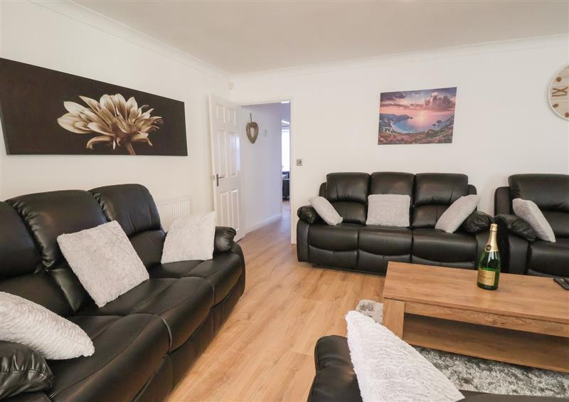 Relax in the living area at THE Beach House, Prestatyn