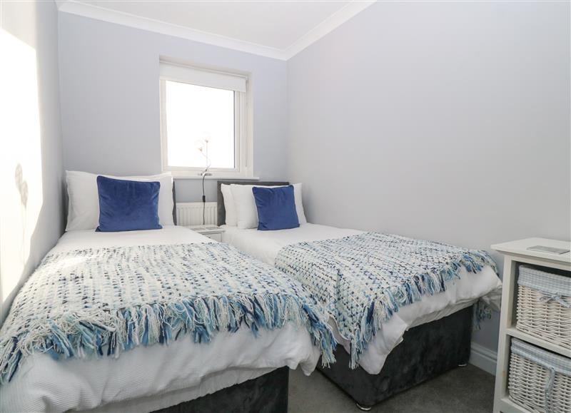 This is a bedroom at The Beach House, Pwllheli