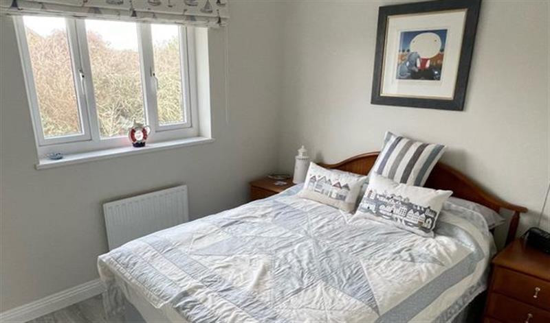 One of the bedrooms at The Beach House, West Bay