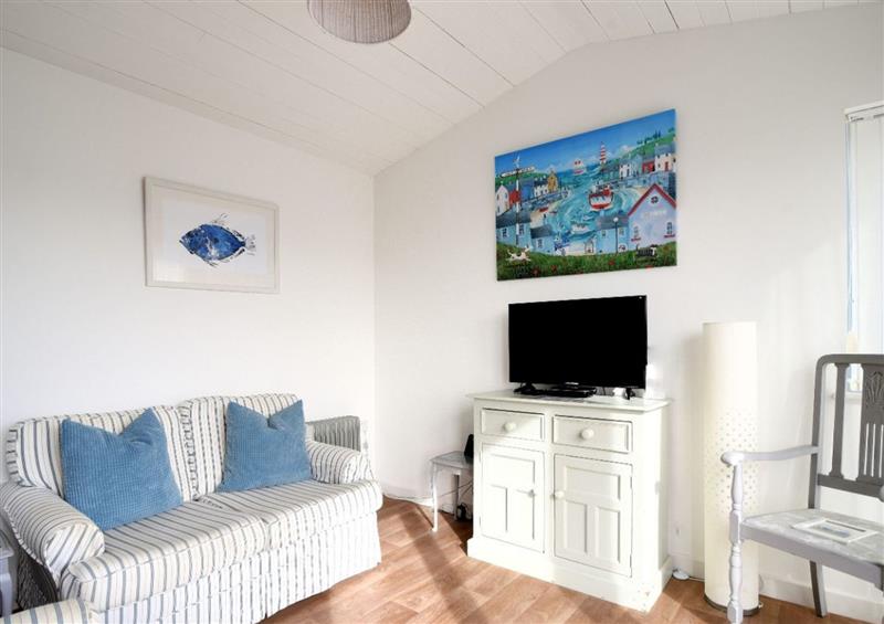Relax in the living area at The Beach Hut, Lyme Regis