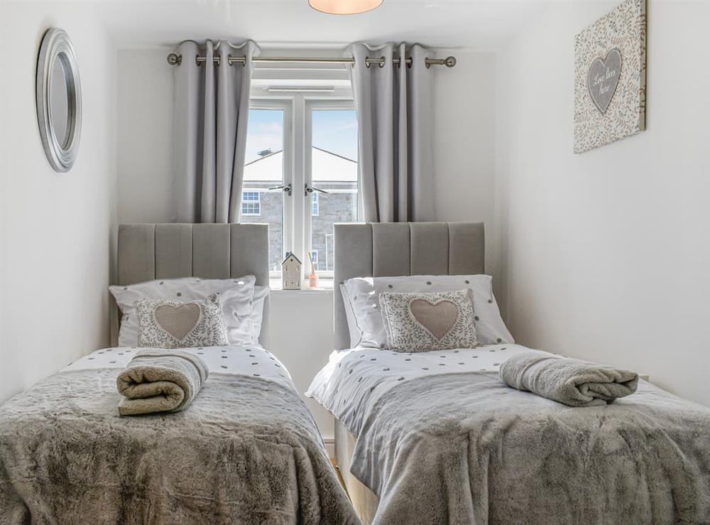 Twin bedroom at The Beach Retreat in Duporth, Cornwall