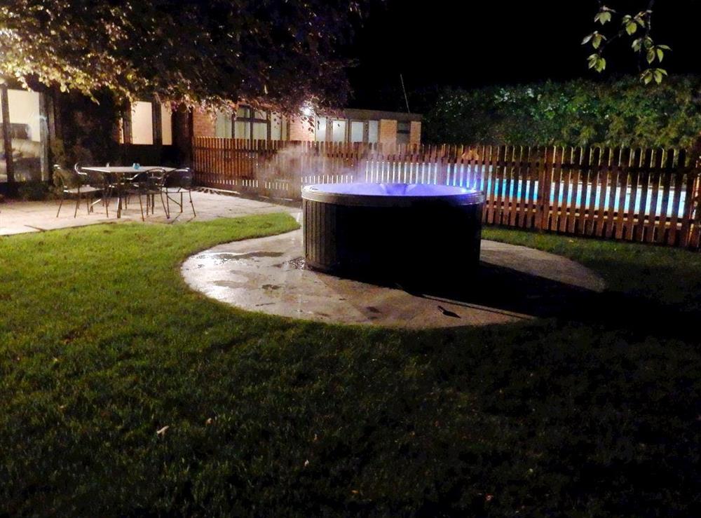 Relaxing hot tub (photo 4) at The Beech House in Corton, near Lowestoft, Suffolk