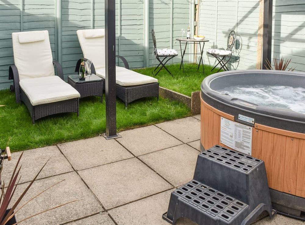 Furnished outdoor area with hot tub (photo 2) at The Beehive in Mundesley, Norfolk