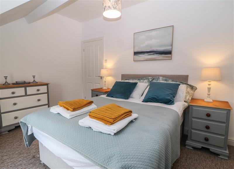 This is a bedroom (photo 3) at The Bell Apartment, Cemaes Bay
