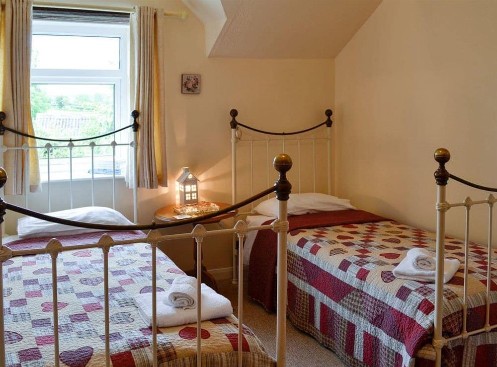 Charming twin bedroom at The Bellringers Cottage in Llandegla, near Wrexham, Denbighshire