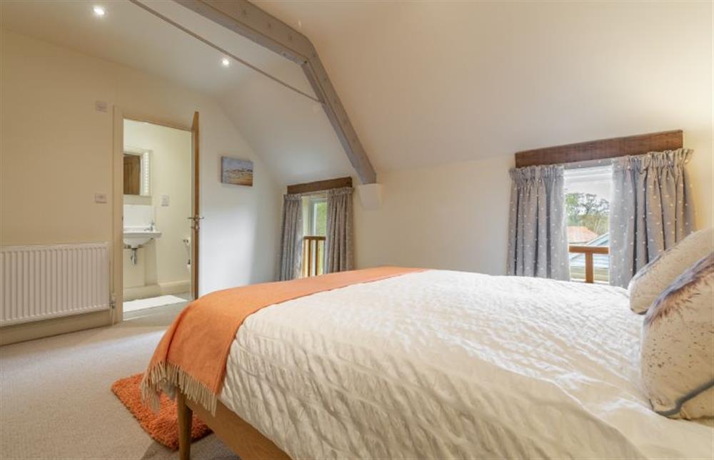 First floor: Bedroom two with en-suite shower room at The Big Barn, Snettisham near Kings Lynn