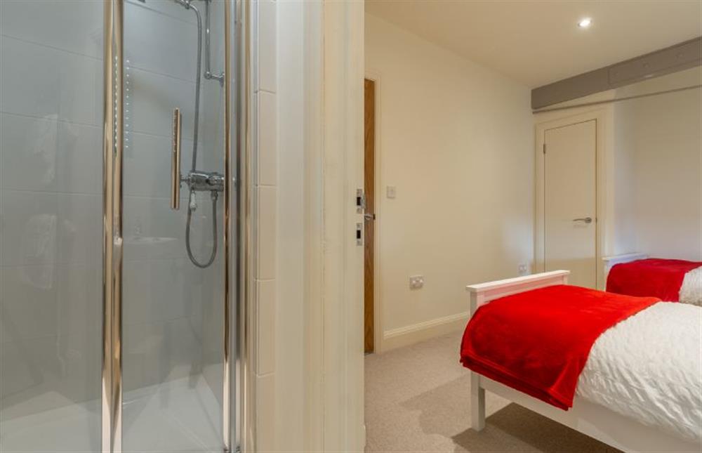 First floor: En-suite with shower cubicle at The Big Barn, Snettisham near Kings Lynn