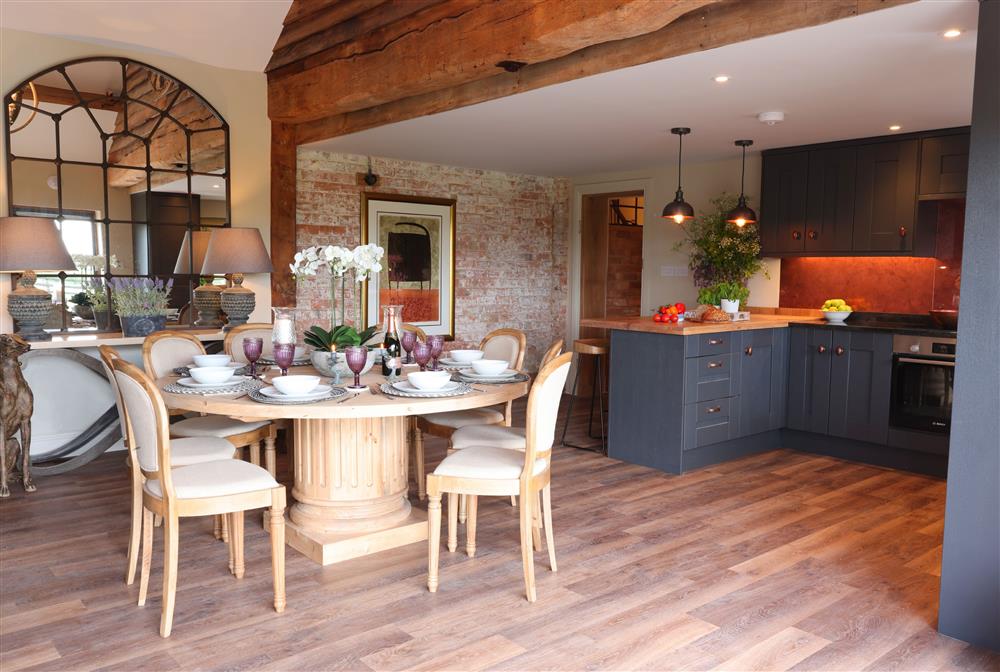 The larger open-plan living area comprises of the sitting area, dining area and kitchen at The Big Barn, Walton, Near Stratford-upon-Avon