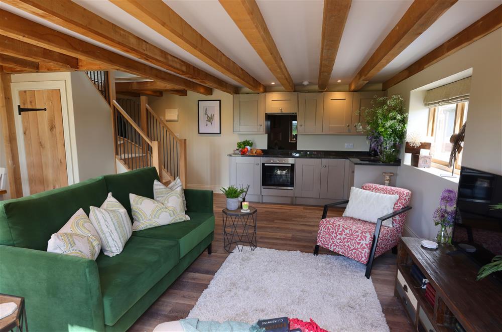 The smaller open-plan living area, accessed via the adjoining door  at The Big Barn, Walton, Near Stratford-upon-Avon