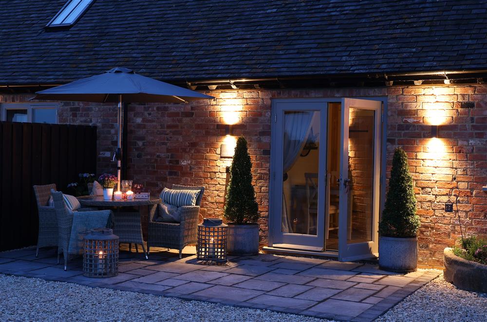 The smaller outdoor area looks equally inviting and is perfect for relaxing in solitude  at The Big Barn, Walton, Near Stratford-upon-Avon