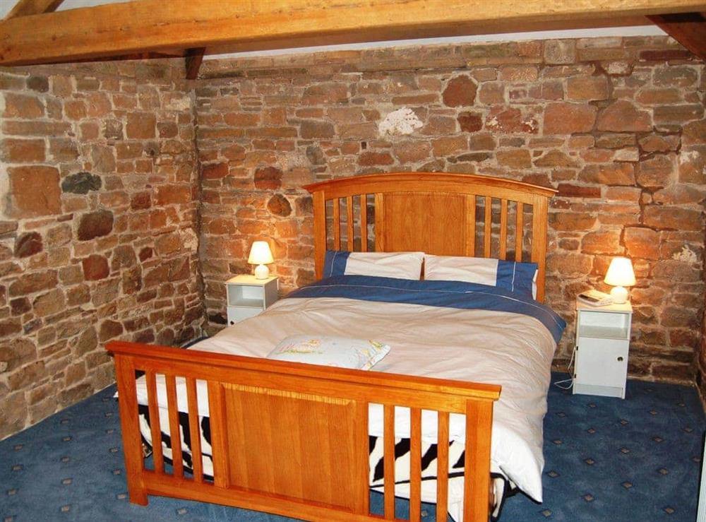 Charming double bedroom with beams at The Bird Bath in Workington, Cumbria