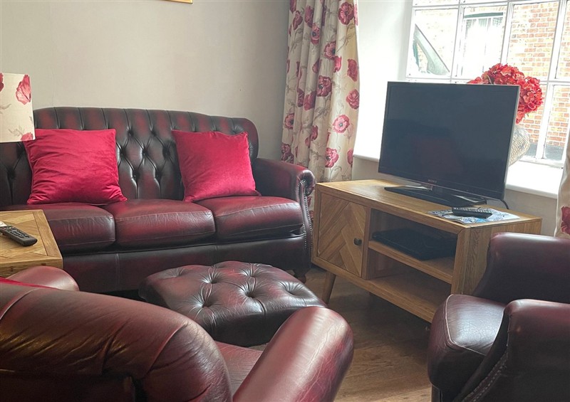 Relax in the living area at The Bittern, Blakeney