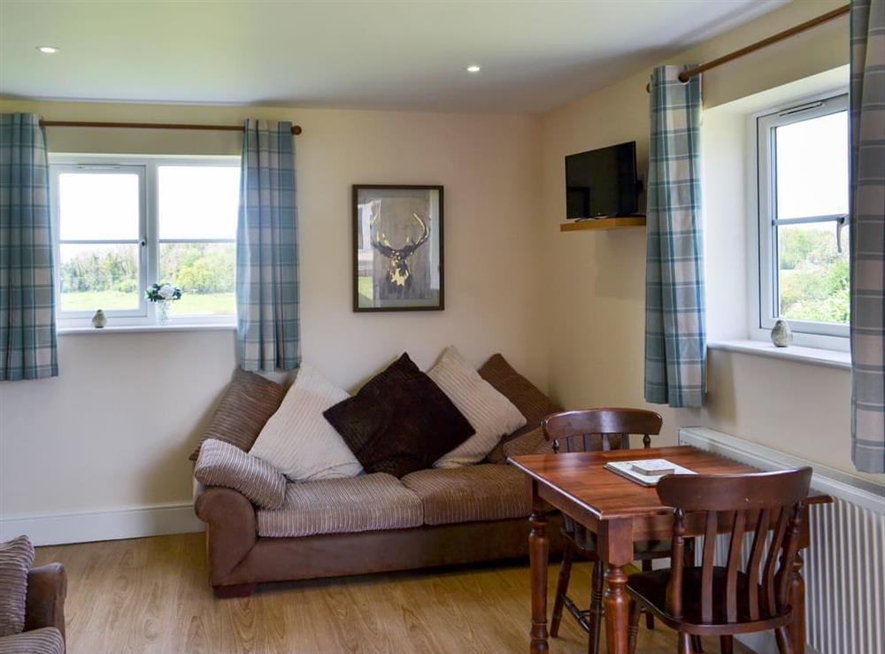 Living room/dining room at The Blacksmiths Arms Cottage 2, 