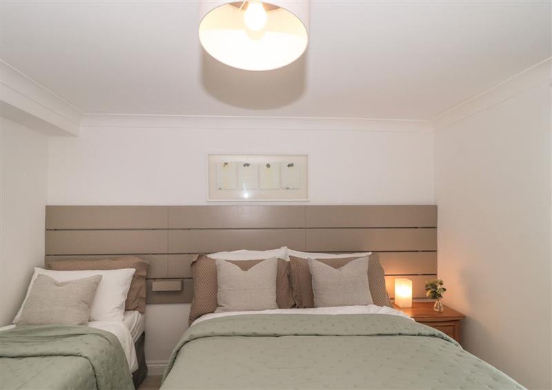 One of the 3 bedrooms at The Blue Cottage, Fortuneswell