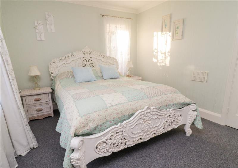 This is a bedroom at The Blue House at Magnolia Lake, Mamhead near Dawlish