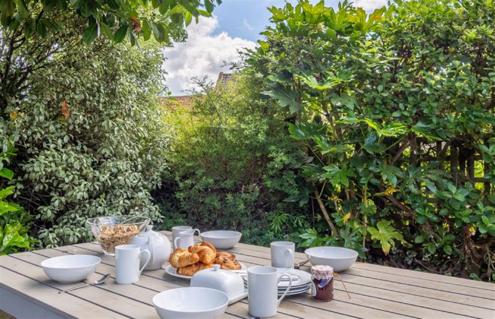Enjoy breakfast in the enclosed garden at The Blue House, Snape