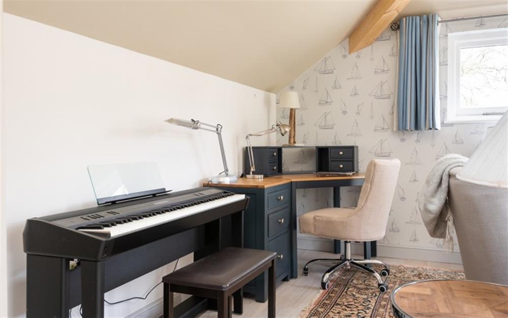 For those that are feeling creative or need to work from home there is space to work or compose! (or play chopsticks!)