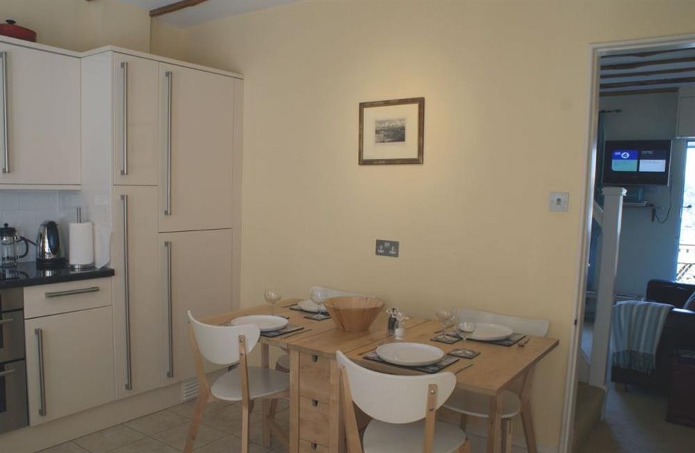 The kitchen and dining area at The Boathouse, Kingswear, Torbay and the Red Cliffs