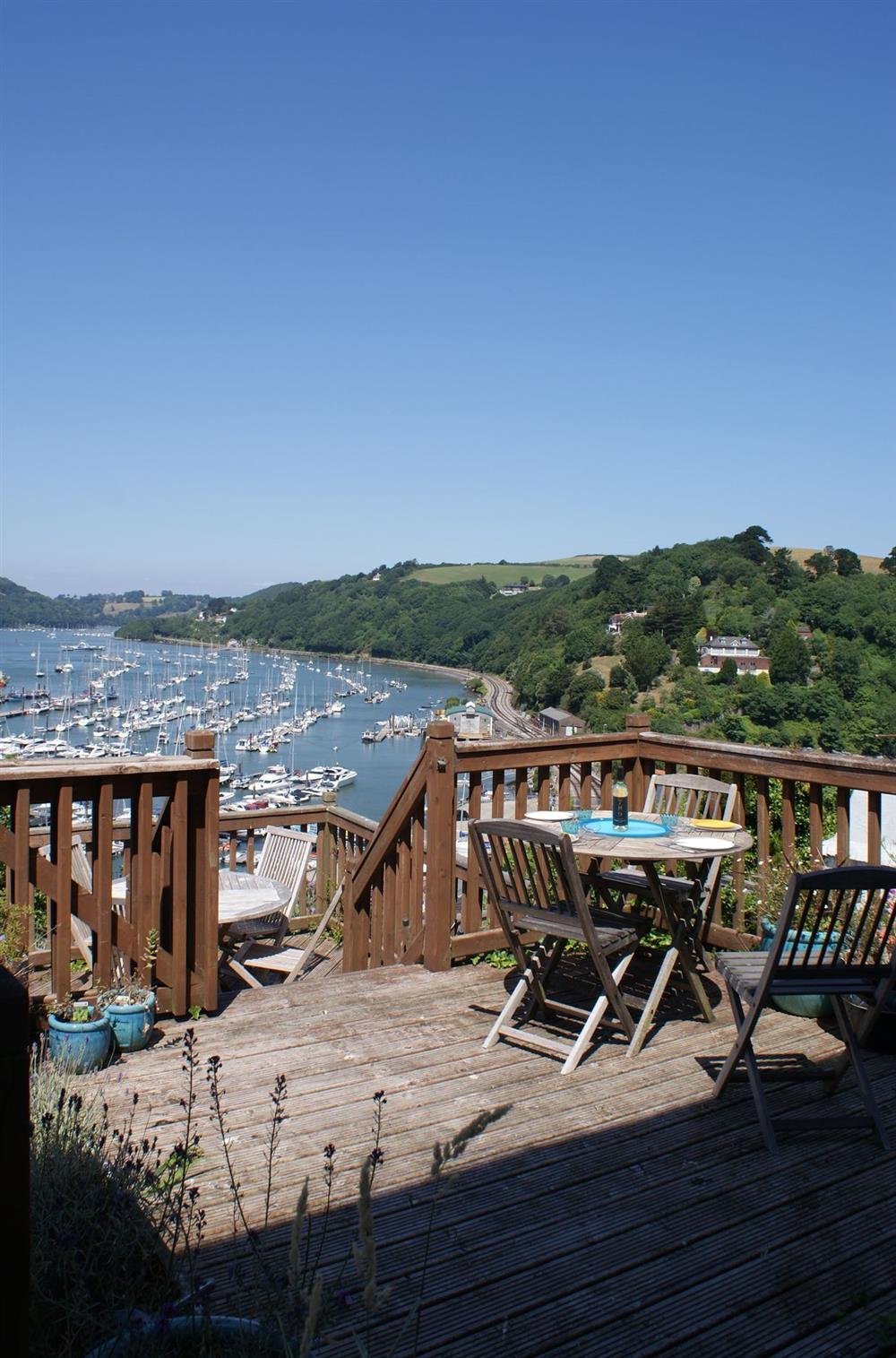Views from the decked area at The Boathouse, Kingswear, Torbay and the Red Cliffs