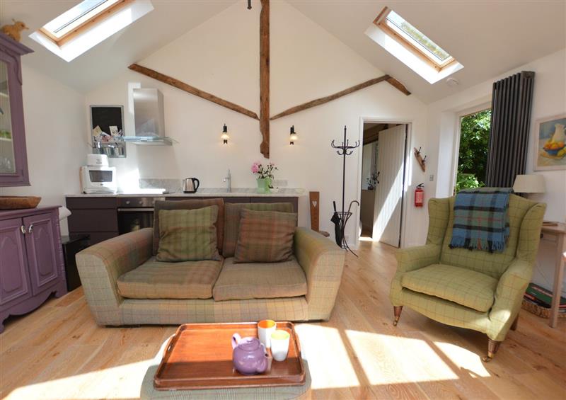 Enjoy the living room at The Bothy at Snape Hall, Snape